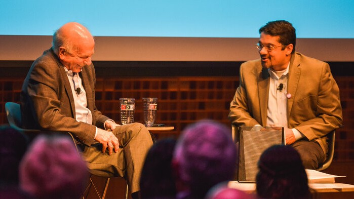 Shankar Vedantam and Daniel Kahneman on stage at a 2018 taping before a live audience at NPR in Washington, D.C.